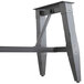 A metal Lancaster Table & Seating trestle table base for a wooden table.