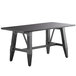 A black solid wood Lancaster Table & Seating dining table with legs.
