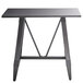 A black rectangular Lancaster Table & Seating bar height table with a grey slate finish and trestle legs.