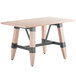 A Lancaster Table & Seating wooden table with legs.