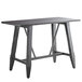 A black Lancaster Table & Seating live edge table with legs.