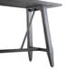 A Lancaster Table & Seating live edge bar height table with metal trestle legs in an antique slate gray finish.