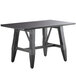 A black Lancaster Table & Seating live edge dining table with legs.