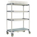 A MetroMax i mobile four tier metal drying rack with wire shelves on wheels.