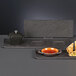 A Libbey faux slate porcelain tray with a bowl and plate of food.
