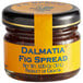 A Dalmatia mini jar of fig spread with a yellow label.