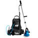 A MotorScrubber cordless hand held disc floor scrubber with a black jet washer.