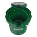 A green plastic container with a round lid.