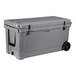 A gray CaterGator outdoor cooler with black wheels and a handle.