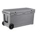 A grey CaterGator outdoor cooler with black wheels.