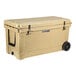 A tan CaterGator outdoor cooler with black wheels and handles.