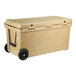 A tan CaterGator outdoor cooler with black wheels.