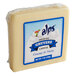 A wrapped block of Alps Gruyere cheese.