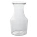 A clear glass carafe with a white lid.