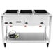 A large stainless steel Vollrath electric hot food table with three sealed wells.