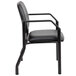 A black Boss antimicrobial guest chair with armrests on a metal frame.