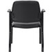 A Boss black antimicrobial guest chair with arms and black leather back.
