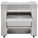 A Vollrath conveyor toaster with a stainless steel top on a counter.