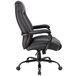 A Boss black leather office chair with arms and wheels.