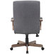 A Boss slate gray office chair with wooden arms and legs.