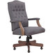 A slate gray Boss office chair with wooden legs and arms.