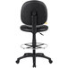 A Boss black Caressoft drafting stool with a metal base.