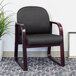 A Boss black fabric side chair with wooden arms and a mahogany base.