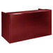 A mahogany laminate reception desk with a red rectangular top and a counter.