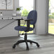 A Boss blue tweed office chair with adjustable arms and a black base.