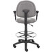 A Boss gray drafting stool with a black base and arms.