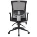 A black office chair with a mesh back and arms.