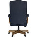 A back view of a Boss navy linen office chair with a driftwood frame.