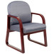 A gray Boss side chair with a wooden frame.