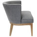 A Boss Ava accent chair with wooden legs and grey fabric seat.