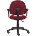 A burgundy Boss office chair with adjustable arms and black wheels.