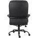 A black Boss office chair with a black leather seat and back.