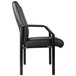 A black Boss LeatherPlus guest chair with a metal frame and armrests.