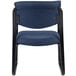A blue Boss fabric guest chair with a black frame.