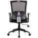 A black Boss office chair with grey mesh.