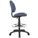 A Boss blue armless drafting stool with a metal base and foot ring.
