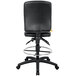 A Boss black leather drafting stool with a metal ring on the bottom.