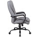 A grey Boss office chair with black arms and wheels.
