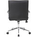 The back of a Boss black vinyl office chair with chrome base and wheels.