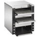 A stainless steel Vollrath Dual Conveyor Toaster with two openings on a shelf.
