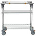 A Metro PrepMate MultiStation metal cart with wheels and shelves.
