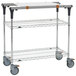A Metro PrepMate MultiStation metal cart with wheels and shelves.