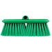 A green Carlisle Sparta Flo Thru vehicle and wall cleaning brush with long bristles.