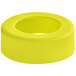 A yellow silicone band with a hole in the middle.