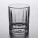 A close up of a Libbey Flashback clear glass on a white table.