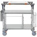 A Metro PrepMate MultiStation cart with galvanized shelving and drawers on wheels.